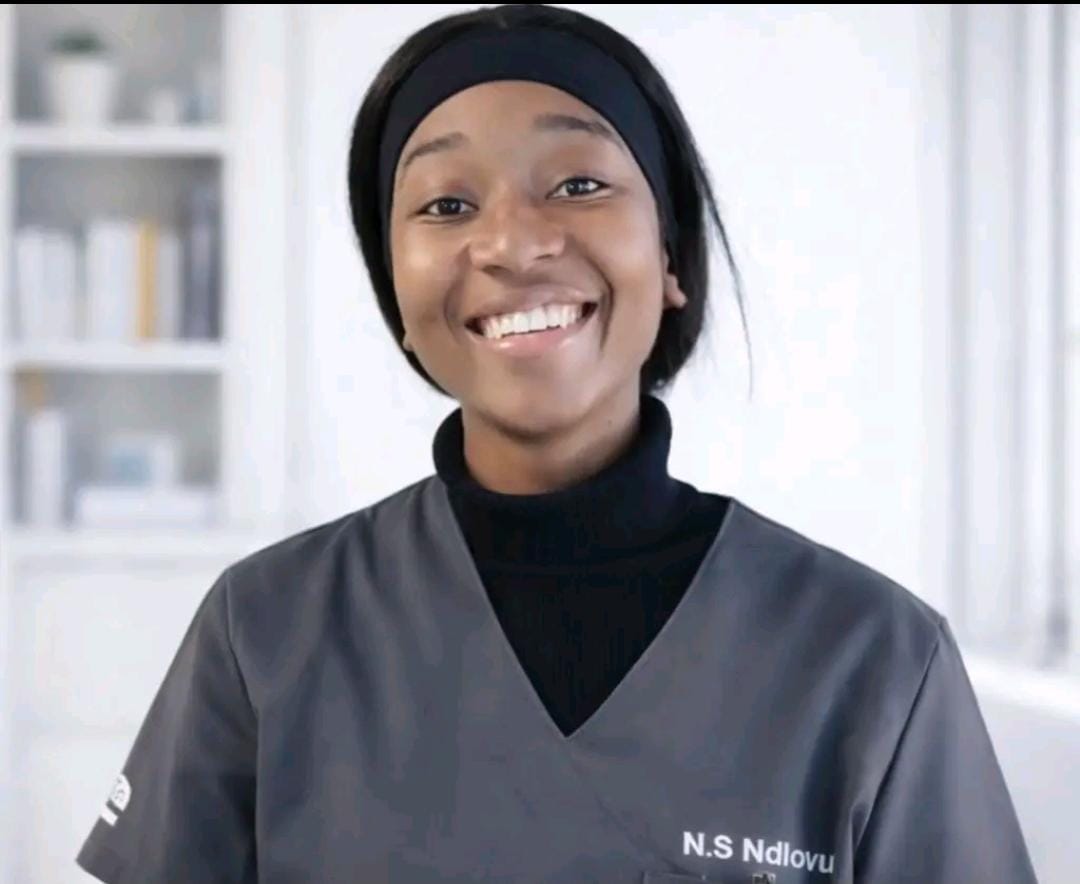 Audiologist conducting hearing test